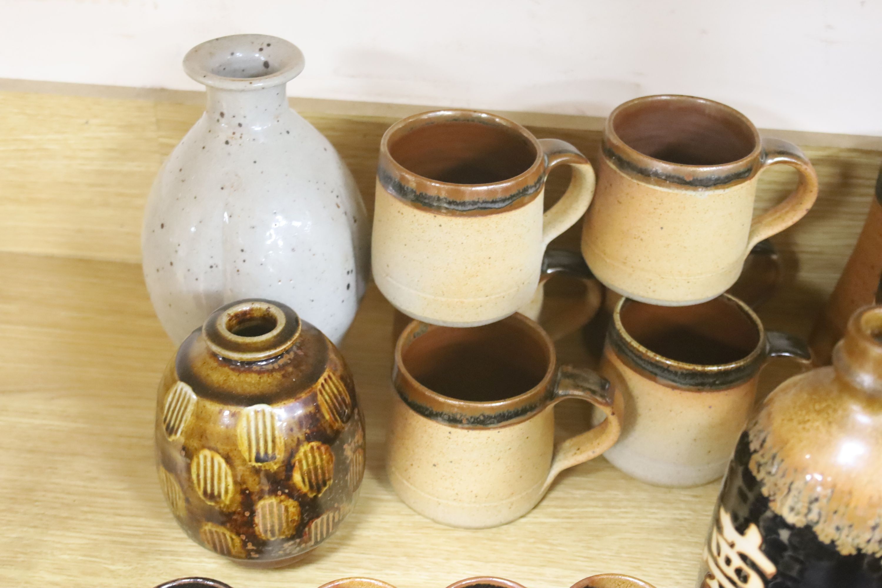 A collection of Studio pottery vases and a Bellarmine